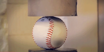 Animated Gif showing: A Baseball Being Crushed In Slow Motion
