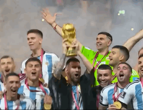 Animated Gif showing: Lionel Messi Holding The World Cup 2022 Trophy