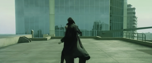 Animated Gif showing: Keanu Reeves Skipping Bullets Scene - Rooftop Showdown - The Matrix