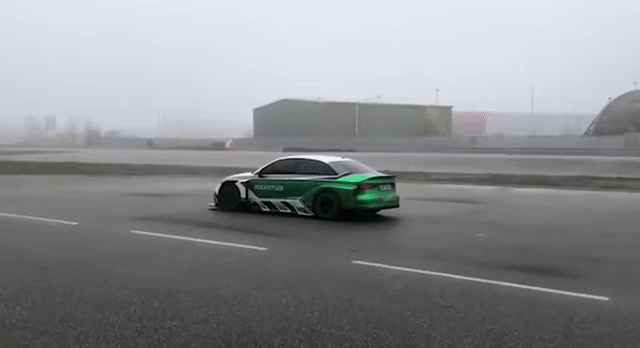 Animated Gif showing: Spinning Car - How Does He Do It??
